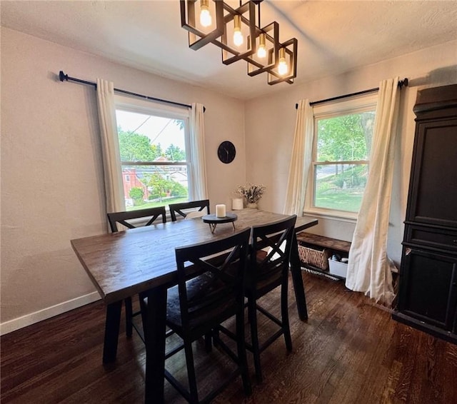608 Wible Run Rd, Shaler, PA 15209 - dining area featuring a chandelier, dark wood-style flooring, plenty of natural light, and baseboards