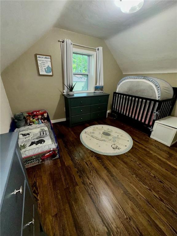 608 Wible Run Rd, Shaler, PA 15209 - bedroom featuring wood finished floors, lofted ceiling, and baseboards