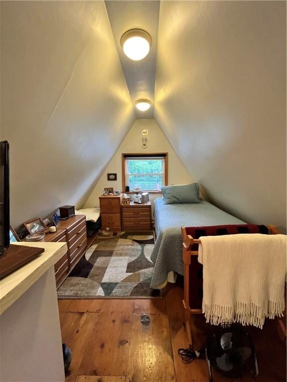688 N Tunnel Rd, Pa, PA 16374 - bedroom with dark wood finished floors and vaulted ceiling