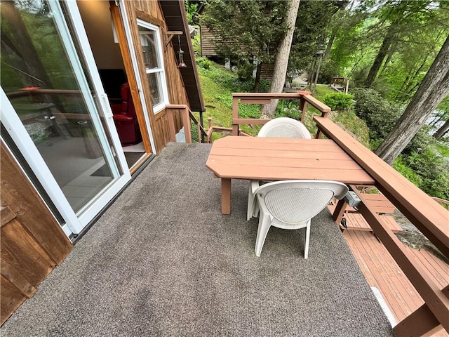 688 N Tunnel Rd, Pa, PA 16374 - view of wooden balcony with outdoor dining space and a wooden deck