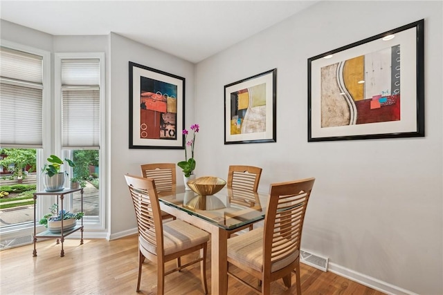 48 Waterfront Dr, Washingtons Landing, PA 15222 - dining space with light wood-style flooring and baseboards