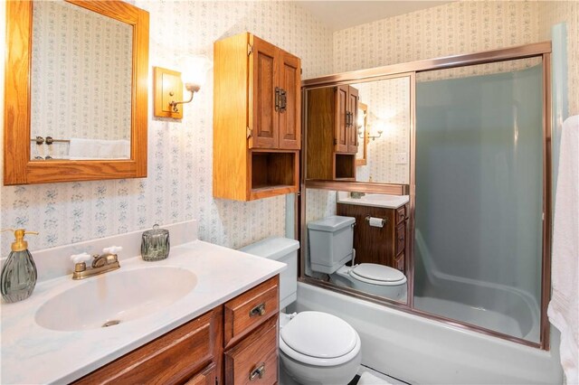 906 Aztec Trl, Coolspring Twp, PA 16137 - full bath with wallpapered walls, toilet, vanity, and shower / bath combination with glass door