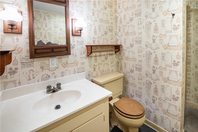 906 Aztec Trl, Coolspring Twp, PA 16137 - bathroom featuring wallpapered walls, toilet, and vanity