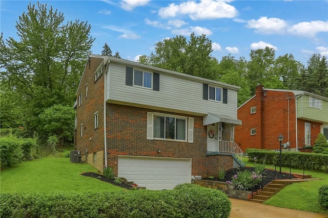 2 Sunnyside Dr, Braddock Hills, PA 15221 - view of front of house featuring a garage, central AC unit, a front yard, and brick siding