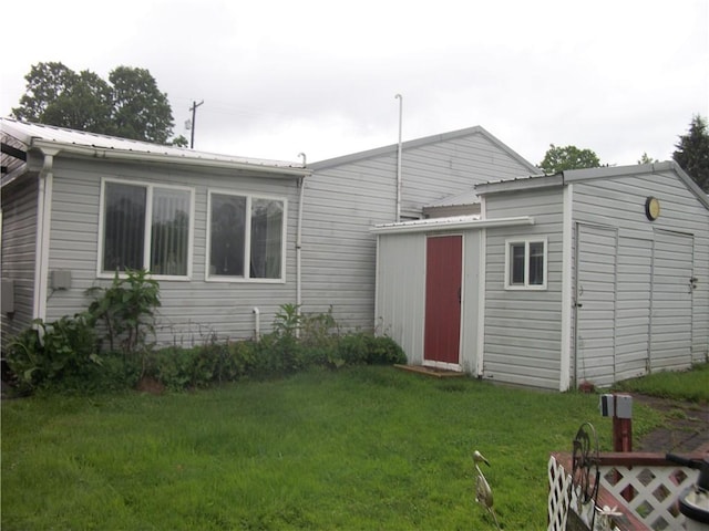 944 Mapletown Rd, Pa, PA 15338 - rear view of house with a yard and metal roof