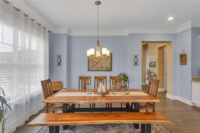 5525 Fontana Ct, Murrysville, PA 15632 - dining space with a chandelier, crown molding, baseboards, and dark wood-type flooring
