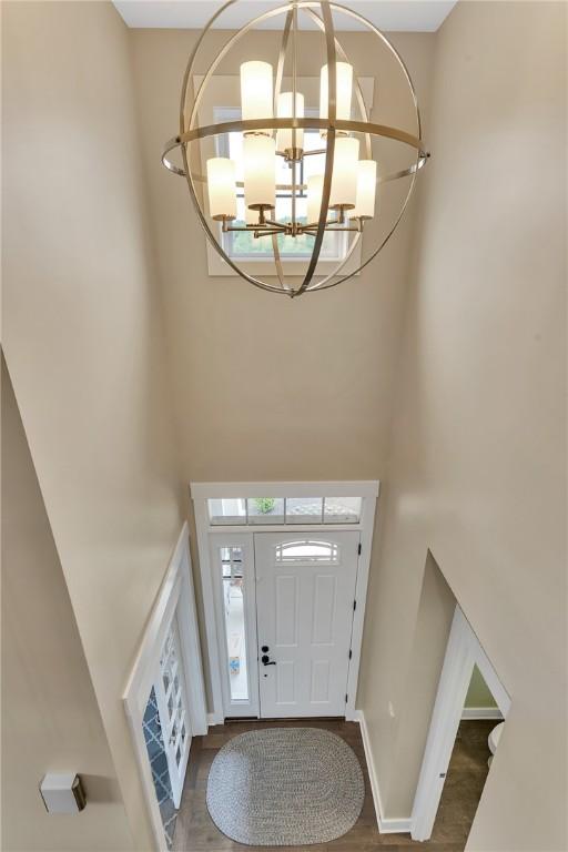 5525 Fontana Ct, Murrysville, PA 15632 - foyer featuring a chandelier and a towering ceiling