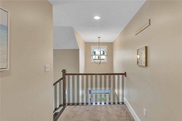 5525 Fontana Ct, Murrysville, PA 15632 - staircase featuring a chandelier, carpet, baseboards, and recessed lighting