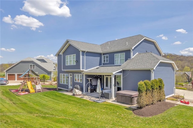 5525 Fontana Ct, Murrysville, PA 15632 - back of property featuring a hot tub, a patio, and a yard