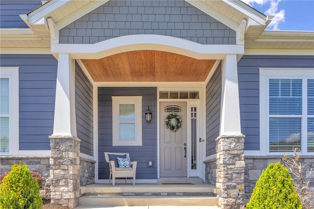 5525 Fontana Ct, Murrysville, PA 15632 - view of exterior entry with covered porch and stone siding