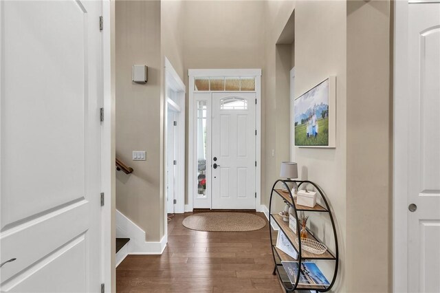 5525 Fontana Ct, Murrysville, PA 15632 - entrance foyer with wood finished floors, stairway, and baseboards