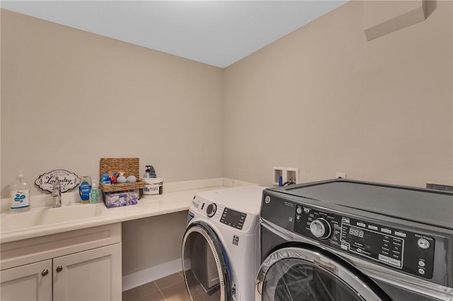 5525 Fontana Ct, Murrysville, PA 15632 - laundry area with washing machine and clothes dryer, cabinet space, tile patterned flooring, and baseboards