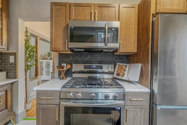 212 Orchard Pl, Sewickley, PA 15143 - kitchen featuring stainless steel appliances and decorative backsplash