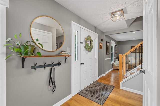 161 Ridgeview Dr, Mccandless, PA 15090 - entryway with light wood finished floors, baseboards, stairs, a textured ceiling, and recessed lighting
