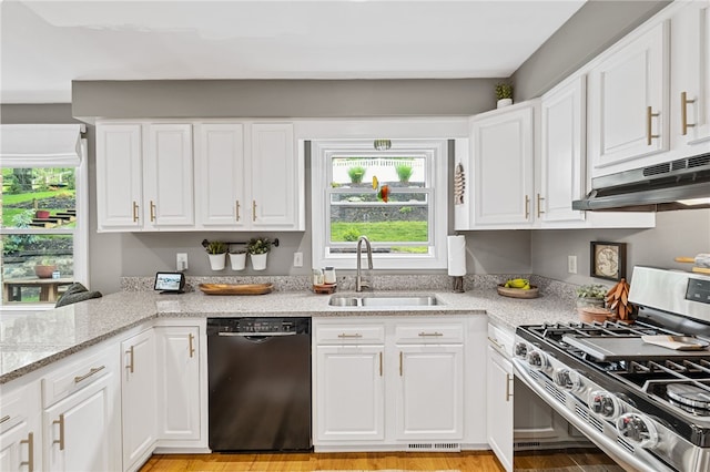 161 Ridgeview Dr, Mccandless, PA 15090 - kitchen featuring dishwasher, gas stove, a sink, under cabinet range hood, and white cabinets