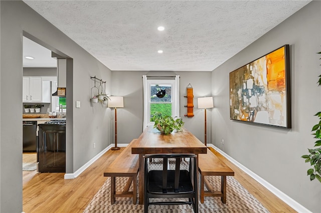 161 Ridgeview Dr, Mccandless, PA 15090 - dining area featuring light wood-type flooring, baseboards, a textured ceiling, and recessed lighting
