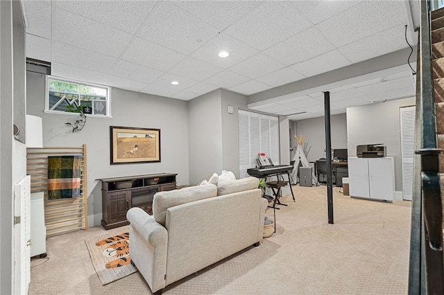 161 Ridgeview Dr, Mccandless, PA 15090 - living room featuring light carpet, a paneled ceiling, and baseboards