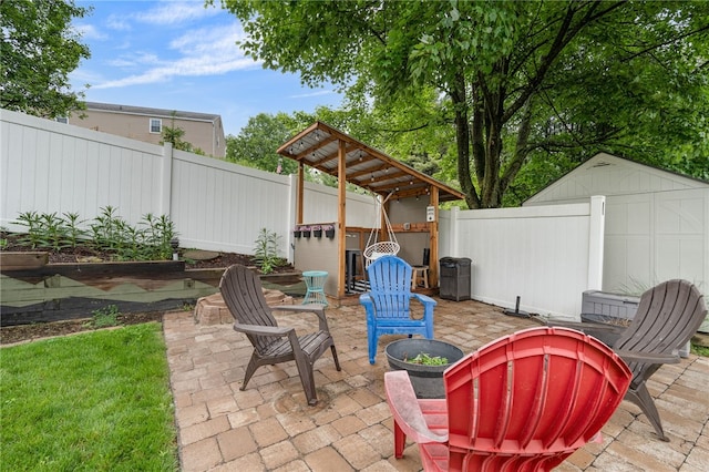 161 Ridgeview Dr, Mccandless, PA 15090 - fenced backyard featuring a patio and an outdoor fire pit