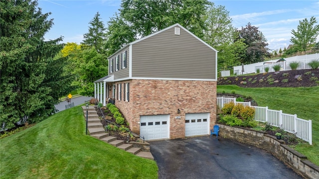 161 Ridgeview Dr, Mccandless, PA 15090 - view of side of property with brick siding, driveway, an attached garage, and stairs