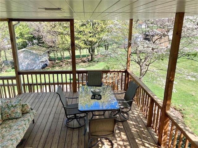 127 Watson Dr, South Union Twp, PA 15445 - wooden deck with outdoor dining space and a yard