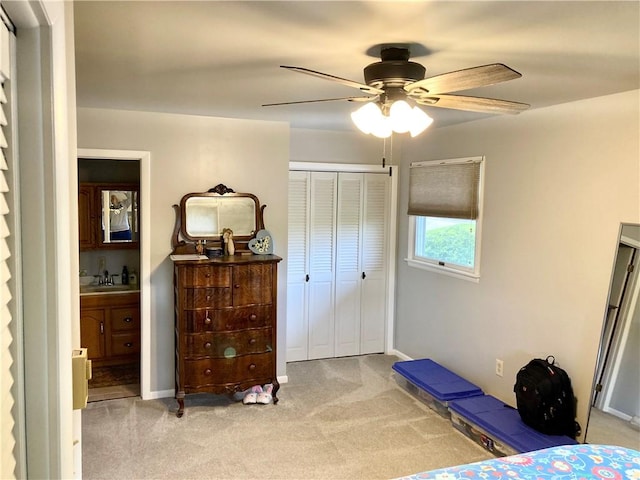 127 Watson Dr, South Union Twp, PA 15445 - bedroom featuring light carpet, a closet, a sink, a ceiling fan, and ensuite bathroom