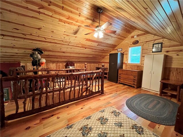 351 2nd Ave, North-Other Area, PA 16353 - sitting room featuring wooden walls, lofted ceiling, wooden ceiling, light wood finished floors, and an upstairs landing