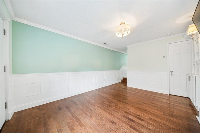 324 Orwell Way, Bloomfield, PA 15224 - empty room with hardwood / wood-style floors, a wainscoted wall, and crown molding