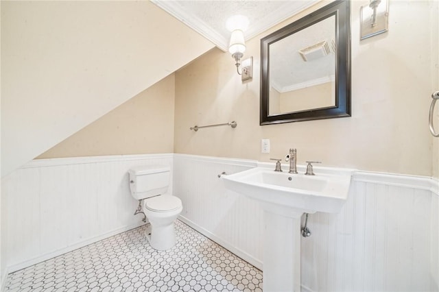 324 Orwell Way, Bloomfield, PA 15224 - bathroom featuring toilet, wainscoting, and ornamental molding