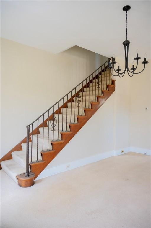 322 Garfield Ave, Mars Boro, PA 16046 - staircase featuring baseboards and a chandelier