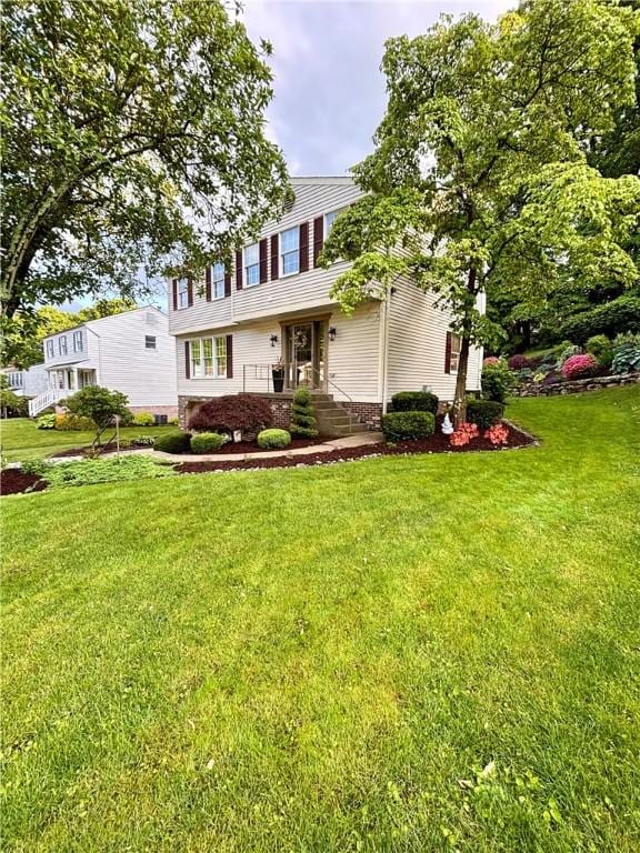 112 Brandywine, Manor, PA 15642 - view of front of house featuring a front yard