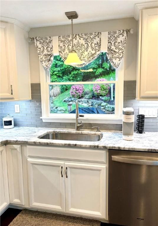 112 Bandywine, Penn Twp Wml, PA 15642 - kitchen featuring dishwasher, a sink, decorative backsplash, light stone countertops, and decorative light fixtures