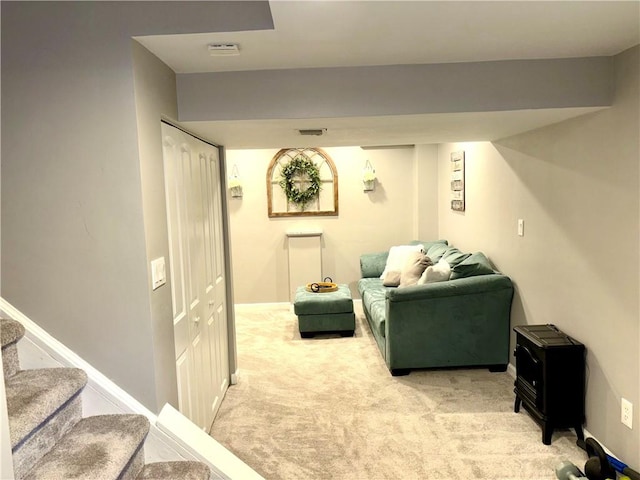 112 Bandywine, Penn Twp Wml, PA 15642 - living room with light colored carpet, stairway, and baseboards