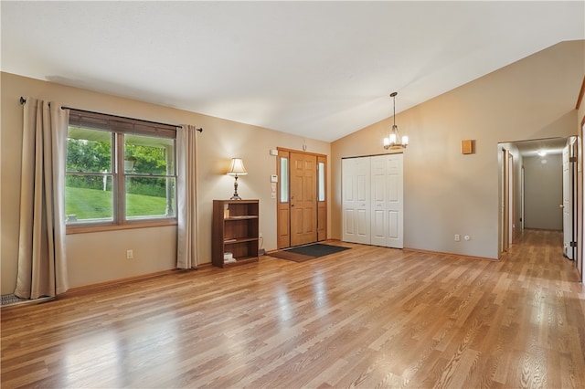 465 Hewitt Ave, Canton Twp, PA 15301 - foyer entrance featuring lofted ceiling, a chandelier, light wood-type flooring, and baseboards