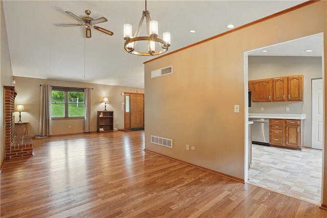 465 Hewitt Ave, Canton Twp, PA 15301 - unfurnished living room featuring light wood-style floors, a chandelier, lofted ceiling, ceiling fan, and recessed lighting