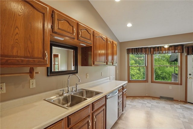 465 Hewitt Ave, Canton Twp, PA 15301 - kitchen featuring a sink, stainless steel dishwasher, light countertops, vaulted ceiling, and recessed lighting