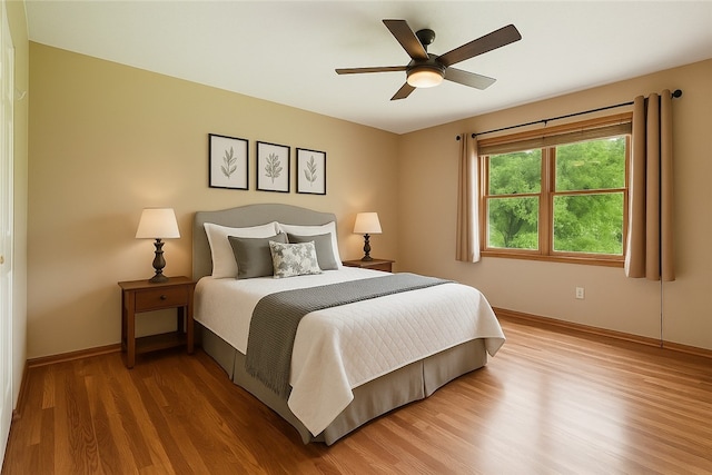 465 Hewitt Ave, Canton Twp, PA 15301 - bedroom with light wood-style floors, baseboards, and a ceiling fan