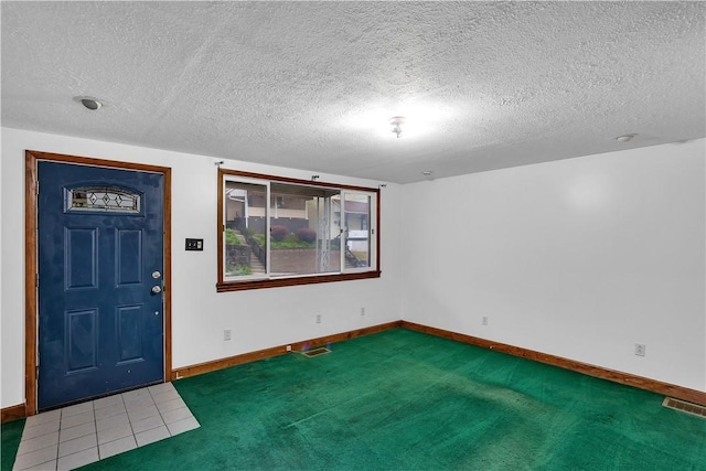 208 Maple Ave, City Of But Se, PA 16001 - entryway with baseboards, a textured ceiling, and carpet floors