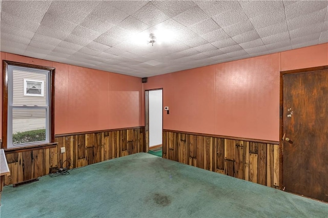 208 Maple Ave, City Of But Se, PA 16001 - carpeted spare room with wooden walls and wainscoting