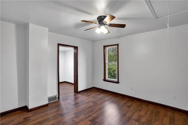208 Maple Ave, City Of But Se, PA 16001 - spare room with attic access, baseboards, and dark wood-type flooring