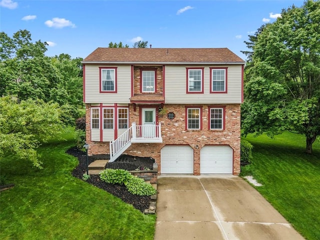 300 Green Flds, Cranberry Twp, PA 16066 - view of front of home featuring concrete driveway, a garage, a front yard, and brick siding