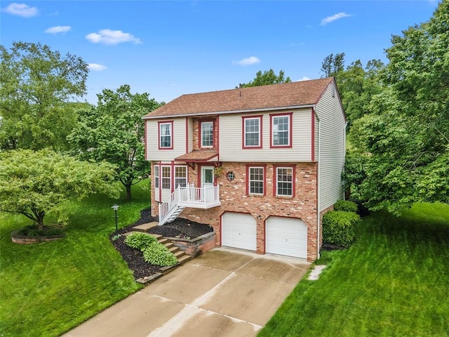 300 Green Flds, Cranberry Twp, PA 16066 - colonial inspired home featuring a garage, concrete driveway, brick siding, a front yard, and stairs