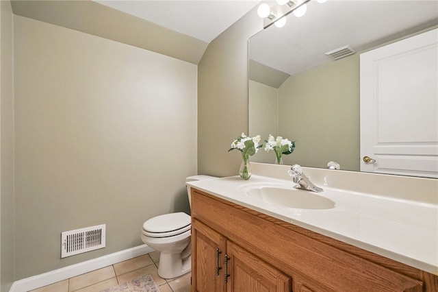 2536 Appletree Dr, Upper St Clair, PA 15241 - bathroom with vanity, toilet, tile patterned flooring, vaulted ceiling, and baseboards