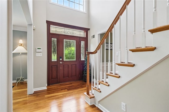 2536 Appletree Dr, Upper St Clair, PA 15241 - foyer entrance with stairway, wood finished floors, a towering ceiling, and baseboards