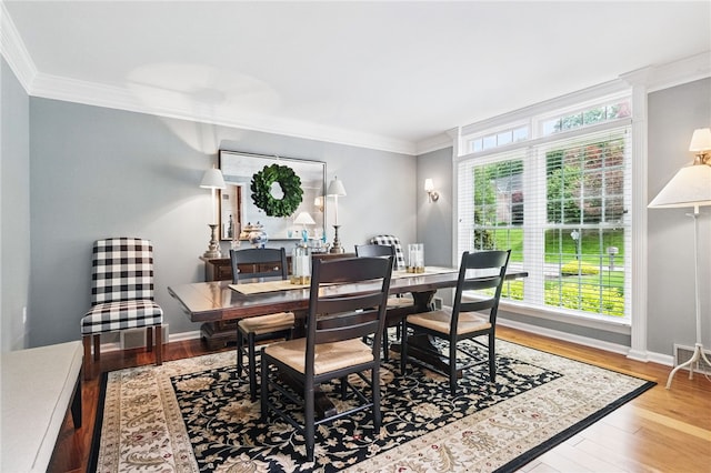 2536 Appletree Dr, Upper St Clair, PA 15241 - dining space featuring crown molding, wood finished floors, and baseboards