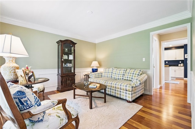 2536 Appletree Dr, Upper St Clair, PA 15241 - living room with crown molding, wood finished floors, and a wainscoted wall