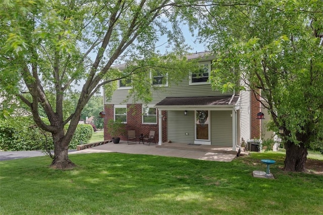 53 Escalon Dr, Findlay Twp, PA 15108 - back of property with a yard, a patio area, cooling unit, and brick siding