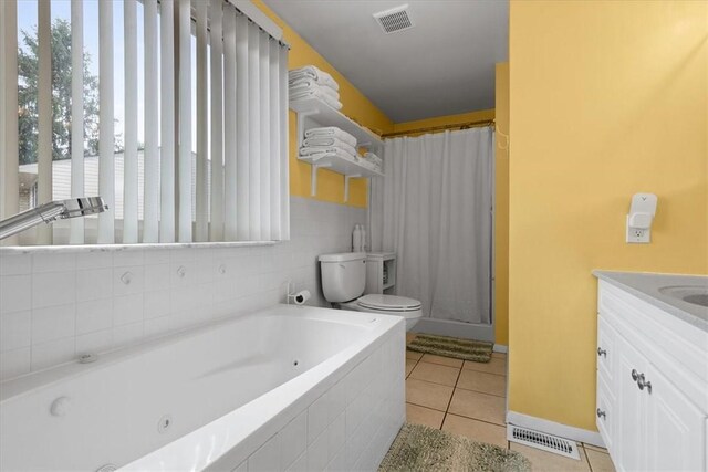53 Escalon Dr, Findlay Twp, PA 15108 - bathroom with toilet, a whirlpool tub, vanity, tile patterned flooring, and a shower with curtain