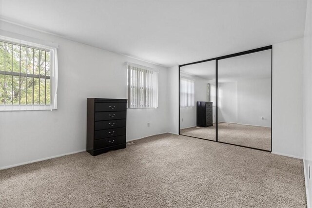 53 Escalon Dr, Findlay Twp, PA 15108 - unfurnished bedroom with carpet flooring, multiple windows, and a closet
