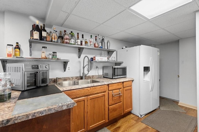 53 Escalon Dr, Findlay Twp, PA 15108 - kitchen featuring open shelves, a sink, stainless steel microwave, white refrigerator with ice dispenser, and a drop ceiling