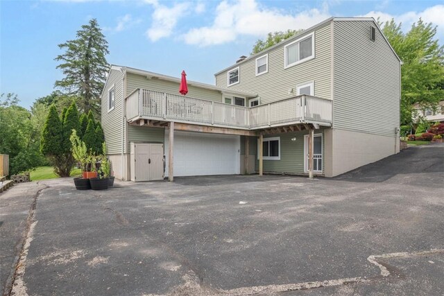 53 Escalon Dr, Findlay Twp, PA 15108 - back of house with driveway and a garage